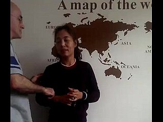 Homme américain et sa femme chinoise et un garçon chinois trois rangées Dongguan